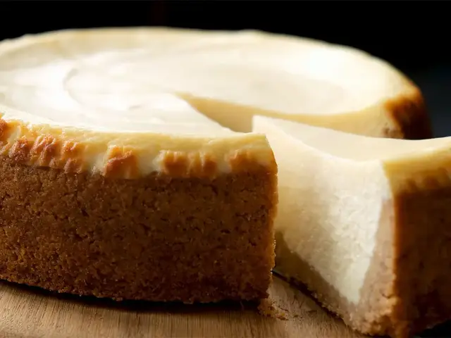 Classic cheesecake with a slice cut