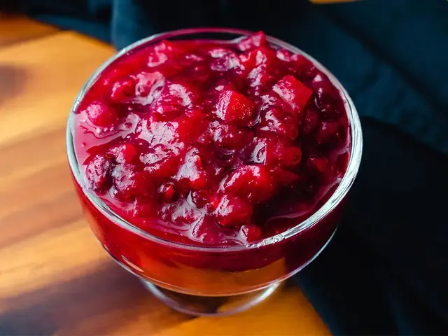 Glass bowl of cranberry sauce