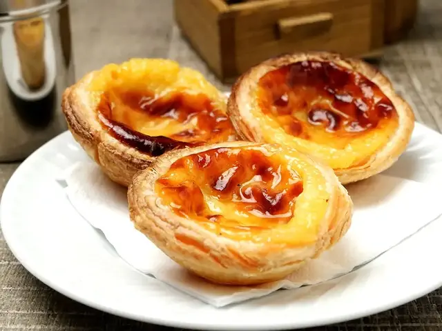 Baked custard tarts on a plate