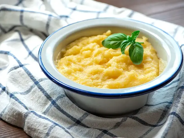 Bowl of creamy polenta with basil