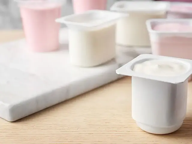 Cups of yogurt on a counter