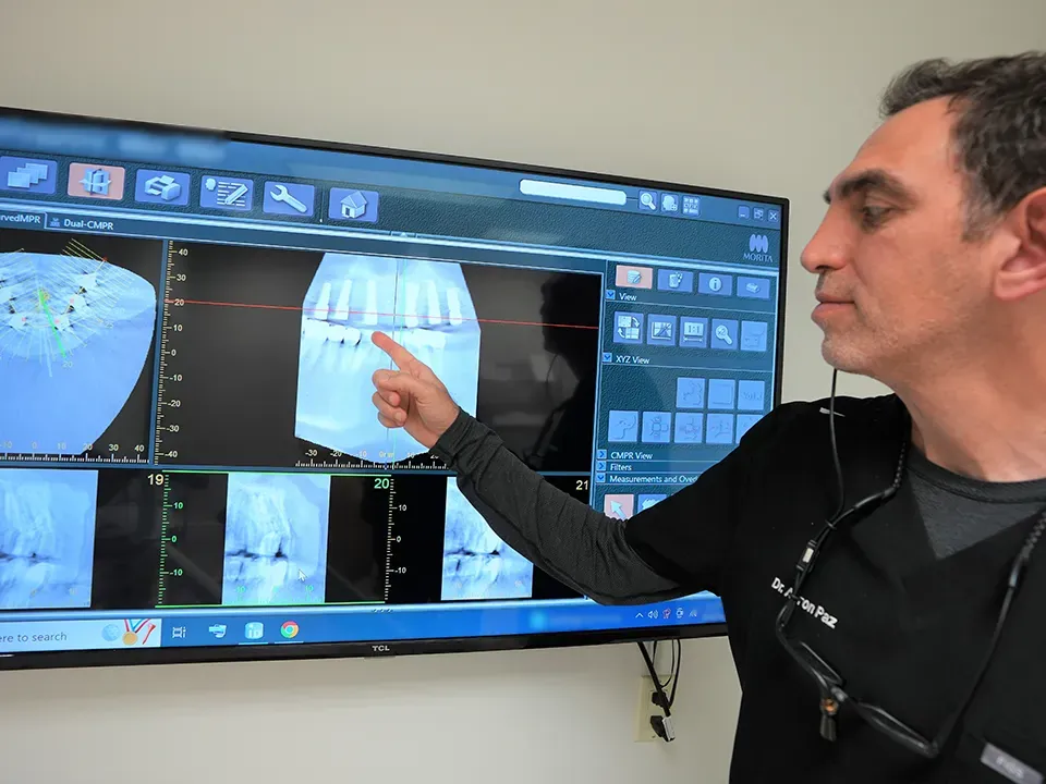 Dr. Paz reviewing digital images on screen