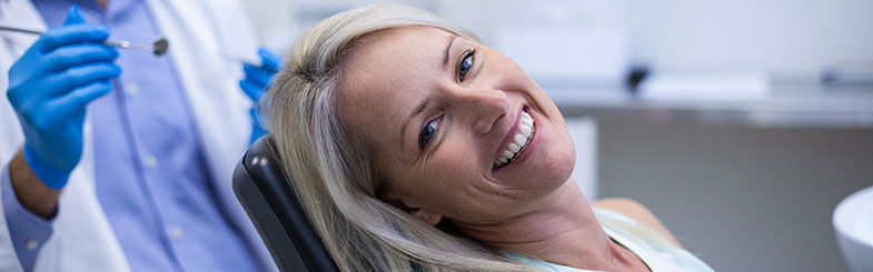 Woman Smiling at the Dentist