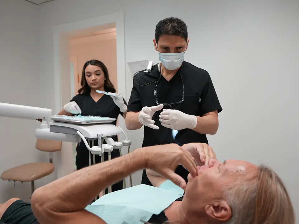 Dr. Tamir explaining the All on X dental implant procedure