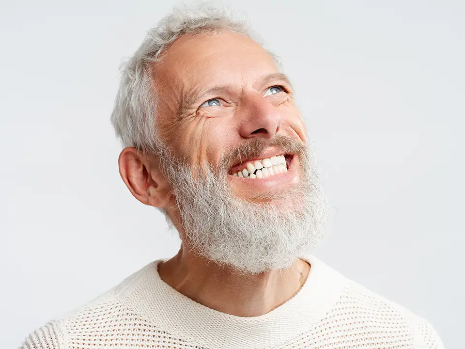 Man enjoying lifetime success with dental implants
